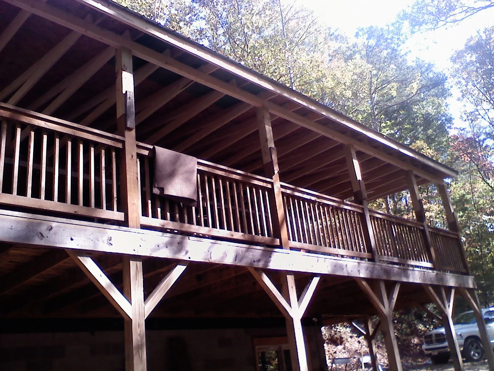 Timber framing under a new elevated porch and deck — Roof Leak Repair in Stapleton by Roofing Brothers